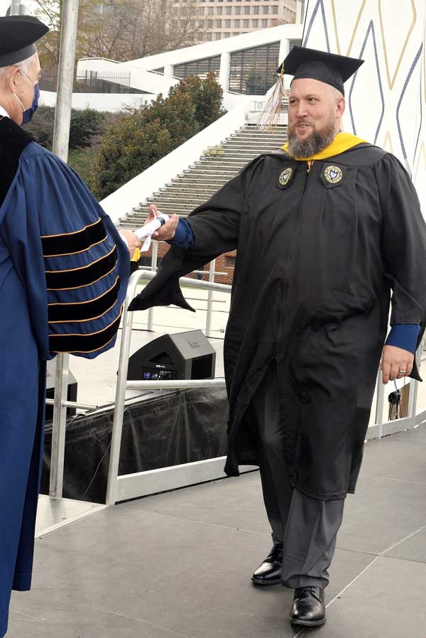 Rick Pangburn Rick Pangburn accepting his degree
